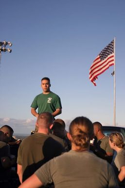 US Marine Corps (USMC) STAFF Sergeant (SSGT) Ramirez, Headquarters & Service Battalion (H&S BN), Marine Forces Pacific (MARFORPAC), debriefs the H&S BN on their performance at the end a unit conditioning exercise, designed to enhance combat readiness and improve physical fitness, held onboard Camp H. M. Smith, Hawaii (HI)