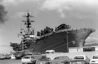 The amphibious assault ship USS NEW ORLEANS (LPH-11) is docked and waiting to be loaded. After loading, it and men of the 31st Marine Amphibious Unit will deploy to the Western Pacific for exercises