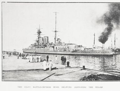 The giant battle-cruiser Hood drawing alongside the wharf