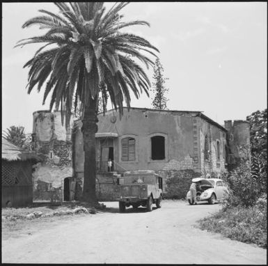 House with two cars parked in front, New Caledonia, 1969 / Michael Terry