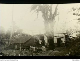 Alexishafen, New Guinea. 1944. Tents set up at the old ice works which became the camp of 17 Field Hygiene Company. This company, with the help of indigenous (native) Papuans, worked at eradicating ..