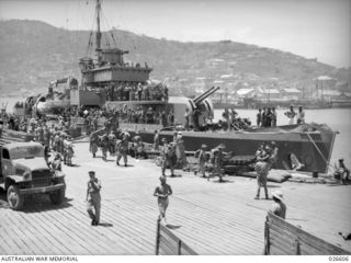 PORT MORESBY, PAPUA. 1942-09. H.M.A.S. WARREGO IN PORT MORESBY HARBOUR AFTER ESCORTING A CONVOY OF TROOPSHIPS AND SUPPLY VESSELS FROM AUSTRALIA