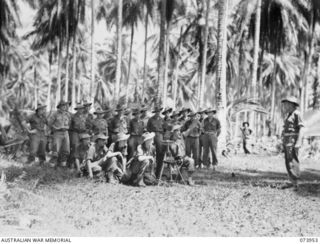 MADANG, NEW GUINEA. 1944-06-17. VX102655 LIEUTENANT G. H. WILLIAMS (7), DELIVERING A LECTURE TO PERSONNEL OF THE MORTAR PLATOON, HEADQUARTERS COMPANY, 58/59TH INFANTRY BATTALION. SHOWN: VX147111 ..