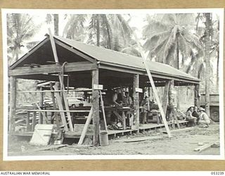 MILNE BAY, NEW GUINEA. 1943-06-27. WORKSHOPS OF "C" GROUP, 2/3RD AUSTRALIAN DOCKS OPERATING COMPANY, ROYAL AUSTRALIAN ENGINEERS, A.I.F