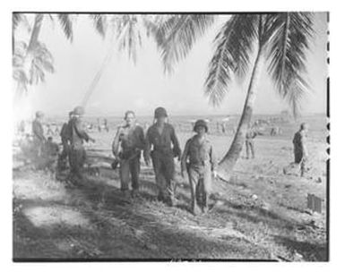 [Negative of Soldiers in Uniform on the Beach]