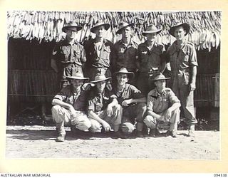 CAPE WOM, WEWAK, NEW GUINEA, 1945-07-31. PERSONNEL OF CANTEEN BULK STORES AND ISSUING POINT, OPERATED BY AUSTRALIAN ARMY CANTEENS SERVICE AT HEADQUARTERS 6 DIVISION. IDENTIFIED PERSONNEL ARE:- ..