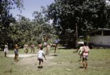 French Polynesia, school children playing volleyball on Tahiti Island