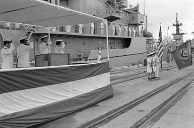 A color guard presents the colors during the decommissioning of the destroyer USS MORTON (DD 948)