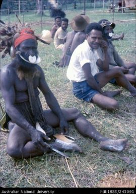 Men seated at the election