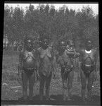 Goaribari women and infant; woman on right and infant are wearing kina, a crescent shell valuable necklace