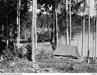 LAKEKAMU RIVER, NEW GUINEA, 1943-09-06. VIEW FROM THE CAMP AREA OF THE 41ST AUSTRALIAN WATER TRANSPORT COMPANY AT GRIM POINT. THIS POINT IS THE CHIEF UNLOADING POINT ON THE RIVER