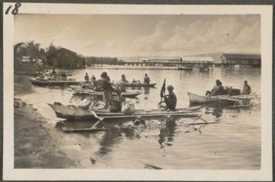 Tolai men bringing their produce in canoes to Rabaul, New Britain Island, Papua New Guinea, approximately 1916, 2