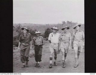 BISIATABU, SOGERI VALLEY, NEW GUINEA. 1943-06-28. OFFICERS OF THE NEW GUINEA LEAVE CAMP. FROM LEFT TO RIGHT: V187327 CAPTAIN (CAPT) R. M. HARRIS; VX117259 CAPT G. G. ROBERTS; N50038 LIEUTENANT ..