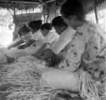 Weaving team in 'Ailine's weaving house. (Finau Hui (hidden), Hiva, Hala'unga, (Kiliati's wife), Ma'ulolo, Tonga Tu'a.)