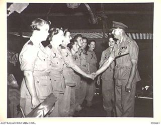 TOROKINA, BOUGAINVILLE, 1945-07-03. HIS ROYAL HIGHNESS, THE DUKE OF GLOUCESTER, GOVERNOR-GENERAL OF AUSTRALIA (9), MEETING AUSTRALIAN ARMY NURSING SERVICE SISTERS IN THE SISTERS' MESS, 2/1 GENERAL ..