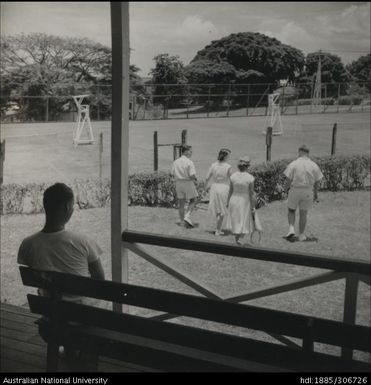 Playing tennis