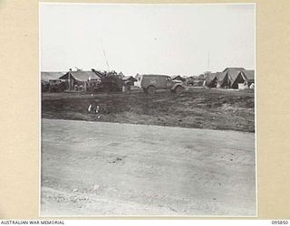 CAPE WOM, WEWAK AREA, NEW GUINEA. 1945-08-30. GENERAL VIEW OF 2/42 LIGHT AID DETACHMENT, CORPS OF AUSTRALIAN ELECTRICAL AND MECHANICAL ENGINEERS AREA