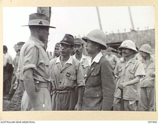 KAHILI, BOUGAINVILLE. 1945-10-01. LIEUTENANT GENERAL M. KANDA, COMMANDER 17 JAPANESE ARMY (3) RECEIVING INSTRUCTIONS FROM LIEUTENANT COLONEL C.W.M. COURT, 2 CORPS (1), PRIOR TO THE DEPARTURE FROM ..