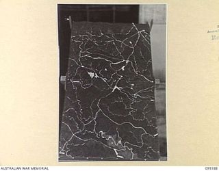 MAPRIK-WEWAK AREA, NEW GUINEA, 1945-08-15. A MODEL MAP OF THE MAPRIK-WEWAK AREA AT THE TOPOGRAPHICAL SECTION ATTACHED HEADQUARTERS FIRST ARMY