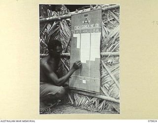 BOUGAINVILLE AREA, SOLOMON ISLAND. 1945-03-21. NGN401 PRIVATE MOHOLI, OF A COMPANY, 1ST NEW GUINEA INFANTRY BATTALION ATTACHED TO THE 7TH INFANTRY BRIGADE RECORDS A KILL TO NO.4 PLATOON ON THE ..