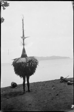 Dukduk on a beach, Rabaul Harbour, New Guinea, ca. 1929 / Sarah Chinnery