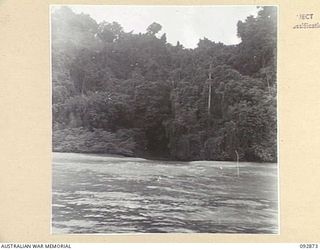 JACQUINOT BAY AREA, NEW BRITAIN. 1945-05. A FAVOURITE PICNIC SPOT FOR HEADQUARTERS 5 DIVISION TROOPS. THE WATERFALL IS ON THE FAR SIDE OF JACQUINOT BAY