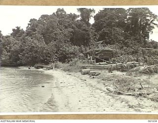 LANGEMAK BAY, NEW GUINEA. 1943-12-11. A BOFORS 40MM ANTI AIRCRAFT GUN SITE ON THE BEACH ON THE SOUTHERN SIDE OF THE BAY