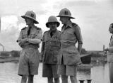 Guam, military officers gathered on pier