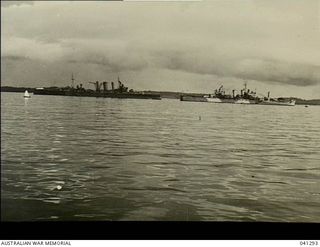 Los Negros Island, Admiralty Group. c. 1944. HMAS Australia, on the left, with United States cruiser USS Canberra on the right. USS Canberra had formerly been USS Pittsburgh but was renamed USS ..