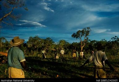 Aboriginal group with long sticks