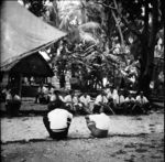 Members of Piula Club in their distinctive toniga (uniform) waiting to perform their next task for the funeral and burial