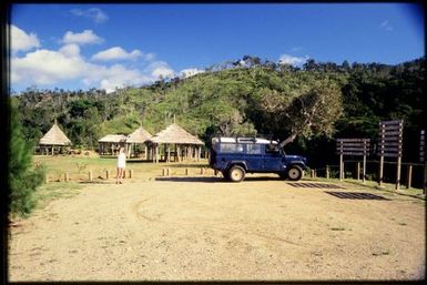 Viv Whitaker with Landrover at roadend recreational area