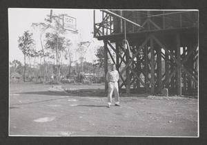 [Man Beside Water Tanks, #2]