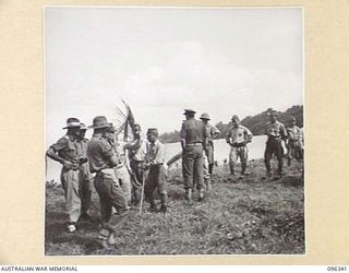 MUSCHU ISLAND, NEW GUINEA, 1945-09-08. OFFICERS OF 6 DIVISION WITH JAPANESE STAFF OFFICERS. THE JAPANESE SOLDIERS, UNDER THE CONTROL OF HQ 6 DIVISION, WILL CONSTRUCT THEIR OWN HOSPITAL AND CAMPS ON ..