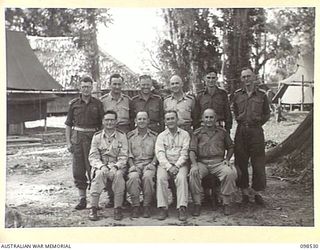 TOROKINA, BOUGAINVILLE. 1945-10-29. CATHOLIC CHAPLAINS OF HEADQUARTERS 3 DIVISION WITH BISHOP T. WADE, US BISHOP OF THE SOLOMON ISLANDS (3) AND VISITING CHAPLAINS. (FOR IDENTIFICATION OF 10 NAMED ..