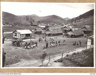 KILA KILA, NEW GUINEA. 1943-12-25. KEREMA BOYS ENJOYING THEIR DANCING AT THE AUSTRALIAN AND NEW GUINEA ADMINISTRATION UNIT NATIVE LABOUR CAMP