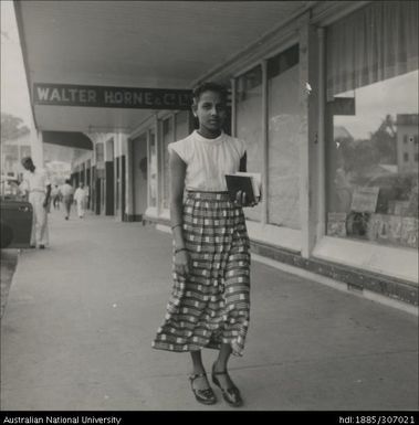 Woman walking through town