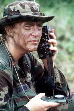 US Air Force Major Jean C. Trakinat, Commanding Officer, 613 Air Communications Squadron, Andersen Air Force Base, Guam, gives coordinates to arriving aircraft during a Search and Rescue drill for Exercise COBRA GOLD '96