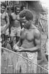 Another man adds a payment