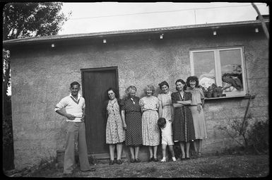 Rene, Nell and Helen Hare, with family