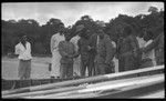 Two men being arrested, and brought on boat, at Malua Bay, Malekula; Malakai Veisamasama in back, on left