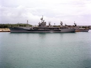 A port beam view of the amphibious command ship USS BLUE RIDGE (LCC 19) moored at the US Naval Ship Repair Facility