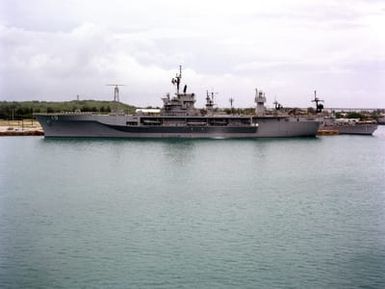 A port beam view of the amphibious command ship USS BLUE RIDGE (LCC 19) moored at the US Naval Ship Repair Facility