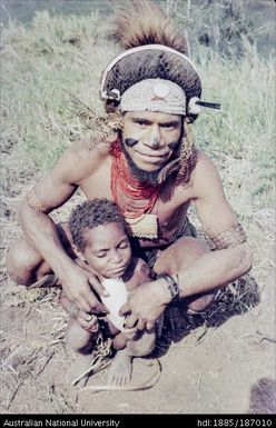 Father with child on a leash