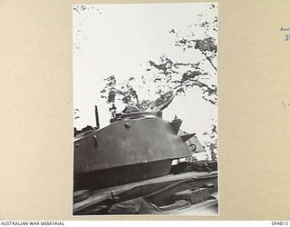 TOROKINA AREA, BOUGAINVILLE, 1945-08-08. THE TURRET OF AN M24 GENERAL CHAFFEE LIGHT TANK DURING TRIALS CONDUCTED FOR THE WAR OFFICE