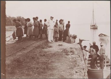 Women disembarking from boat at Vila, New Hebrides, 1906 / J.W. Beattie