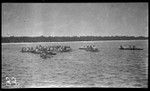 People in canoes