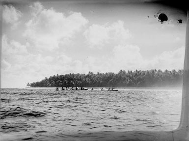 [Canoes on the water]