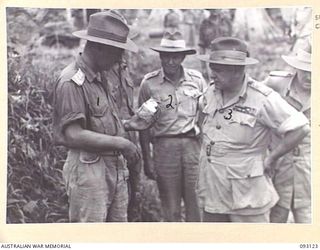 WEWAK AREA, NEW GUINEA, 1945-06-14. LT-GEN G.S. COX, COMMANDING OFFICER 2/4 INFANTRY BATTALION (2), SHOWING GENERAL SIR THOMAS A. BLAMEY, COMMANDER-IN-CHIEF, ALLIED LAND FORCES, SOUTH WEST PACIFIC ..