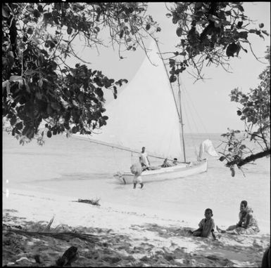 Copra loaded onto a sailing boat, Mana Island, Fiji, November 1966 / Michael Terry